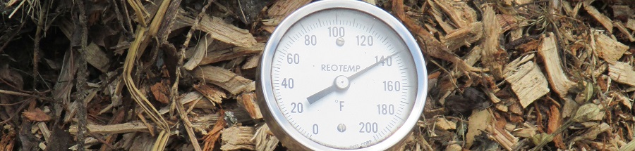 Thermometer in compost pile